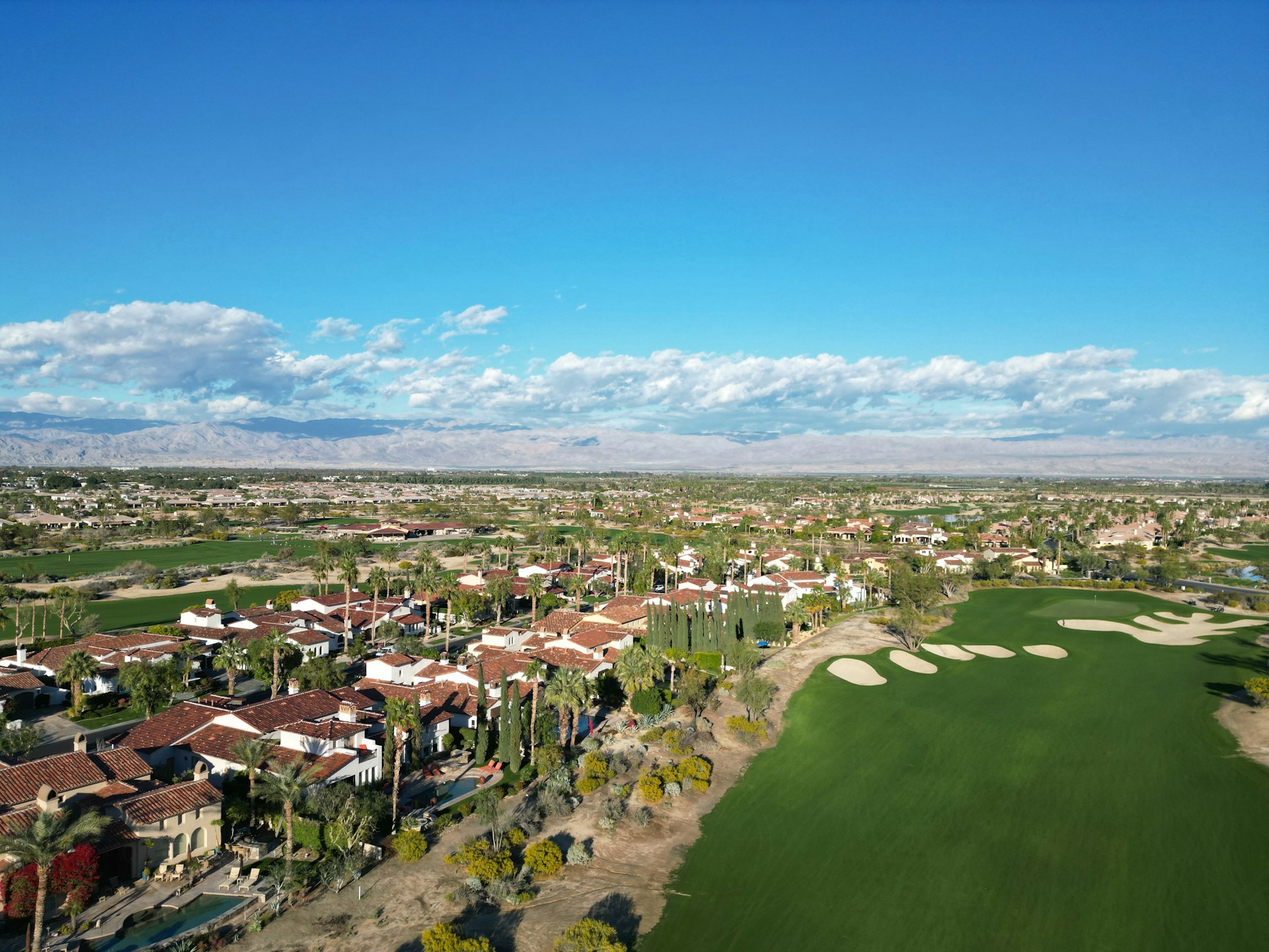 Aerial view of a desert golf course in the Coachella Valley.
